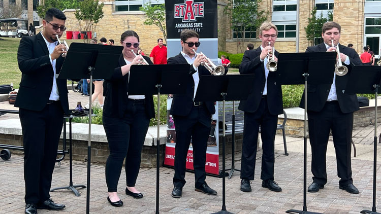 From left to right: Carlos Mejia, Audrey Alpha, Grayden Fields, Zane Kenzik, and Jeremiah Hendrix perform at Create@State.