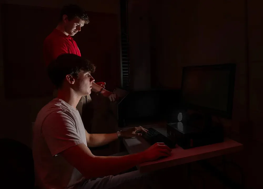 Student practicing cybersecurity at the Student SOC